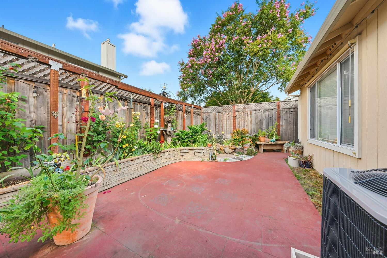 2545 Thistle Creek Street Santa Rosa, CA 95404 - Photo 47 of 59 a view of a patio with table and chairs and potted plants