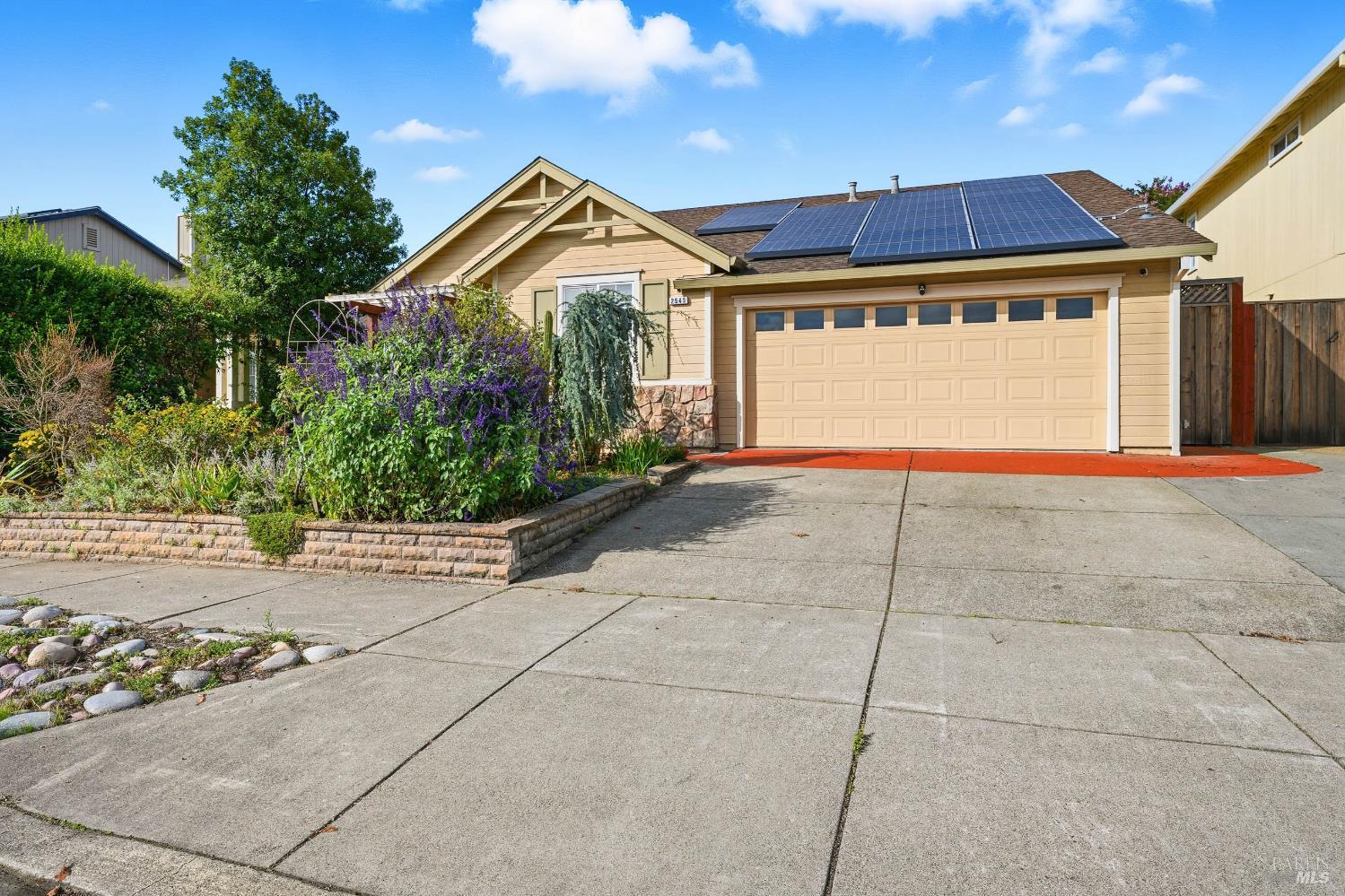 2545 Thistle Creek Street Santa Rosa, CA 95404 - Photo 7 of 59 a view of a house with a yard and potted plants