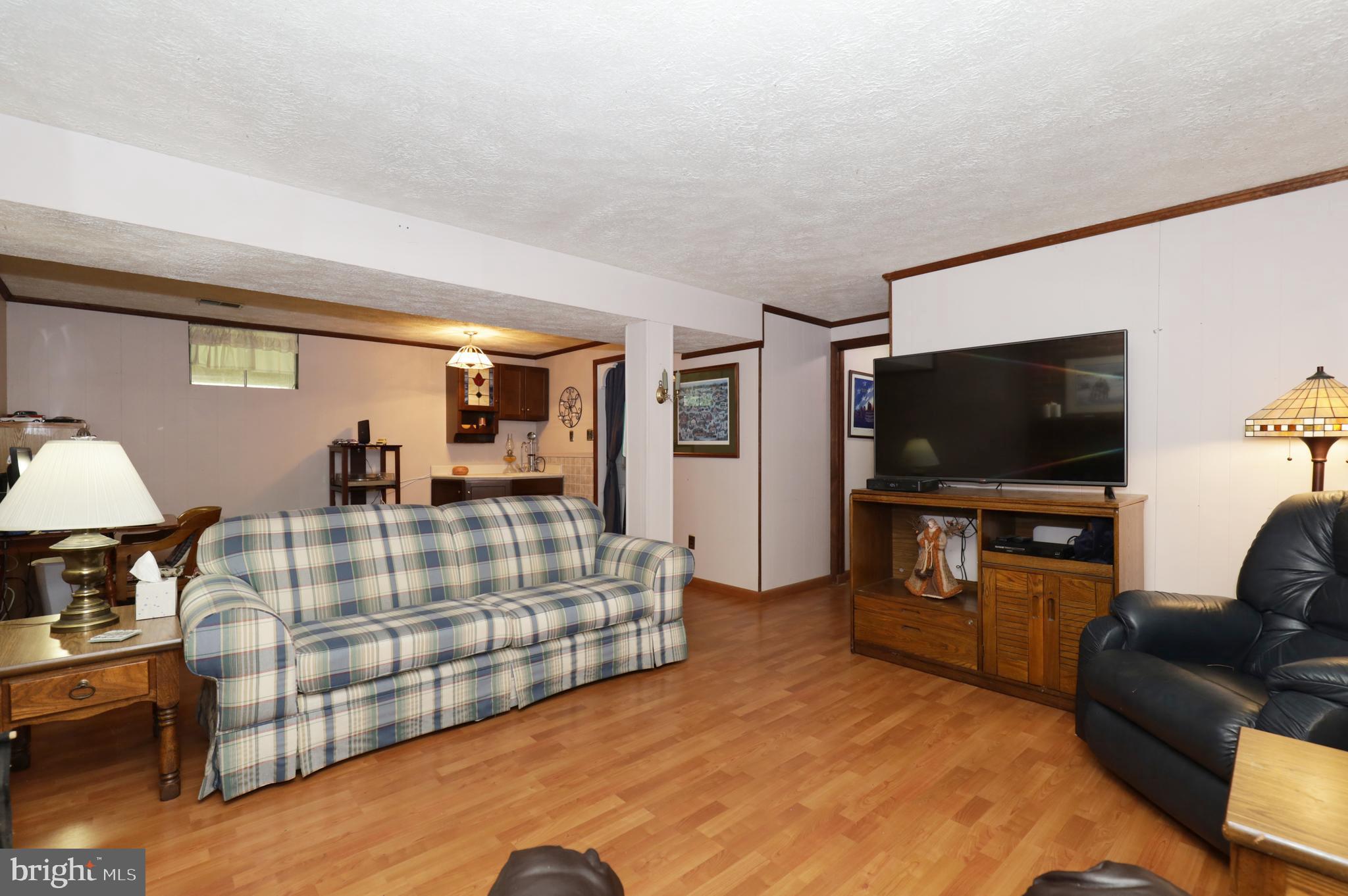8611 Weems Road Manassas, VA 20110 - Photo 24 of 46 Laminate Flooring in Lower Recreation Room