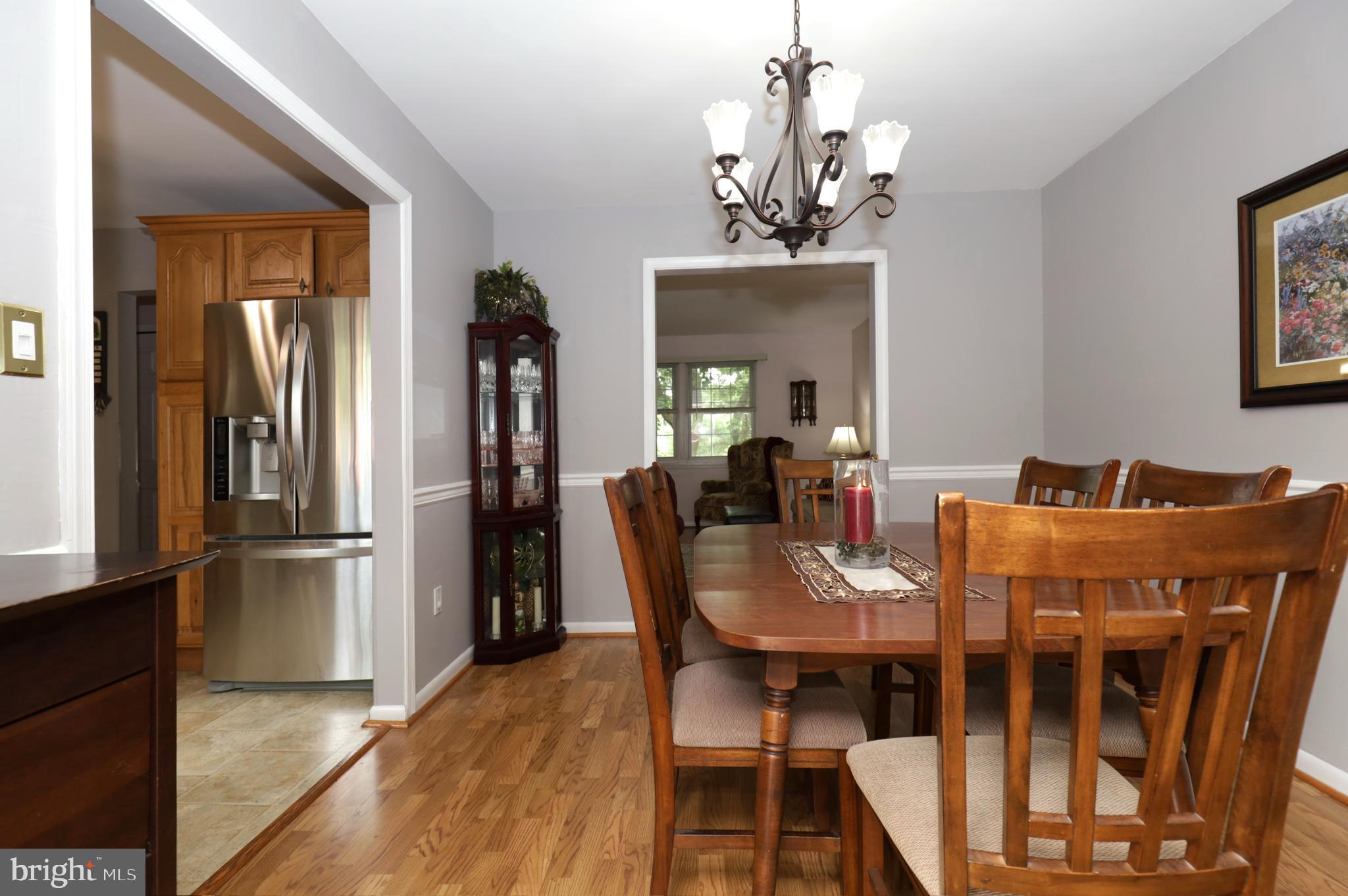 8611 Weems Road Manassas, VA 20110 - Photo 10 of 46 Spacious Separate Dining Room with Laminate Floors