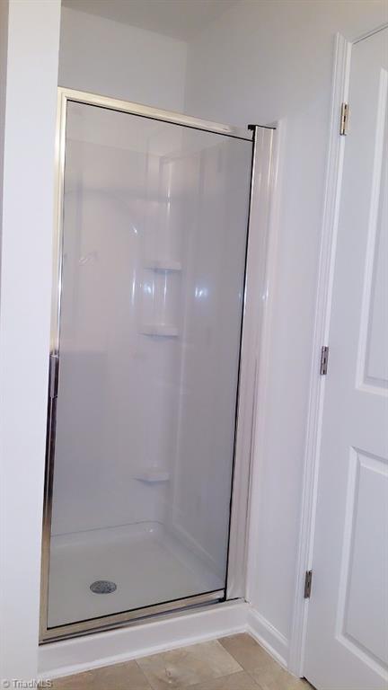 1639 Weatherend Drive Rural Hall, NC 27045 - Photo 13 of 21 Shower in Master Suite Bath. This picture is not of the actual home but is of the same plan. It is to demonstrate spacing and size only. Colors and options may vary from actual home which is under construction.