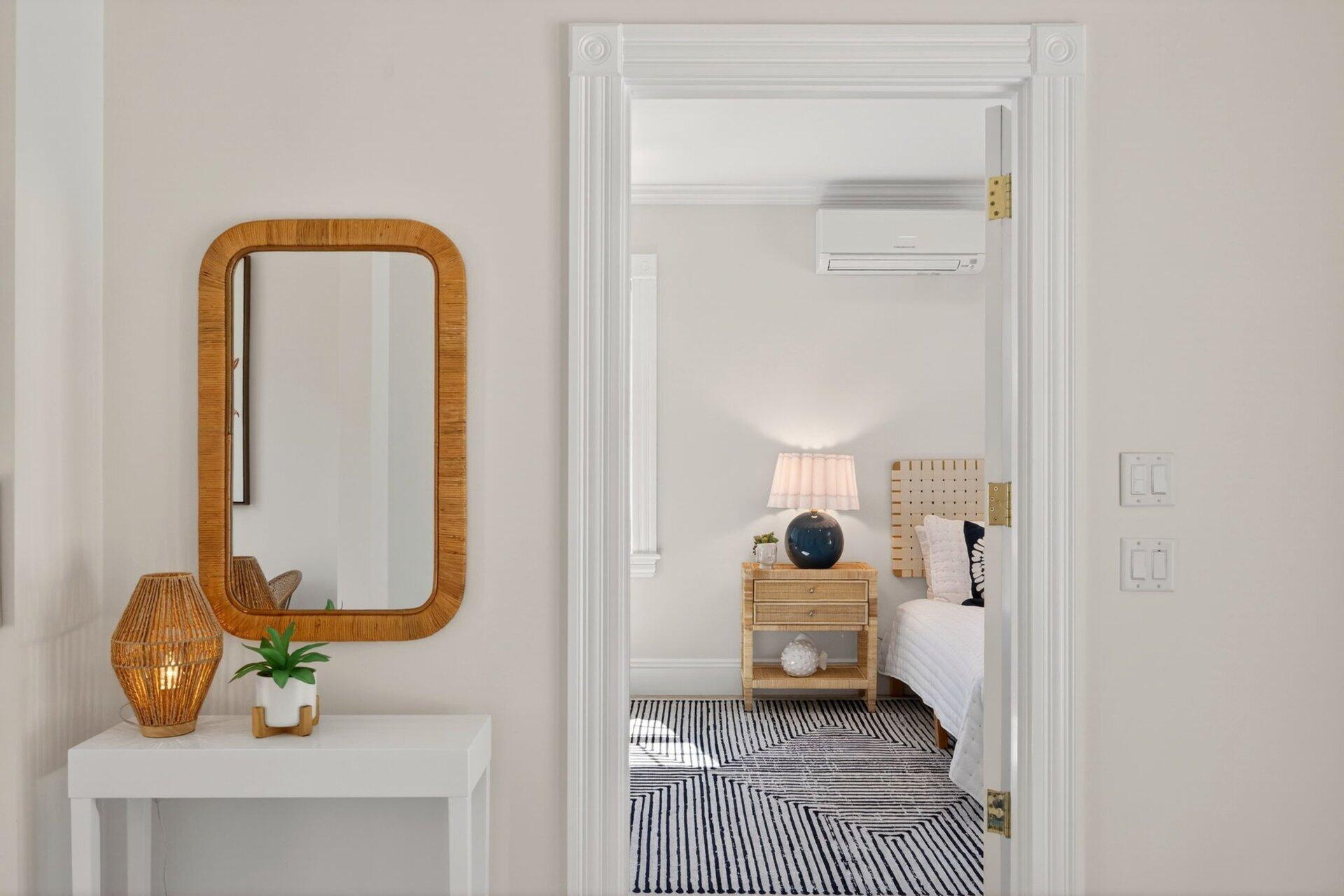 44 Seapuit Road Osterville, MA 02655 - Photo 26 of 33 a view of a room that has a bed and a mirror in it