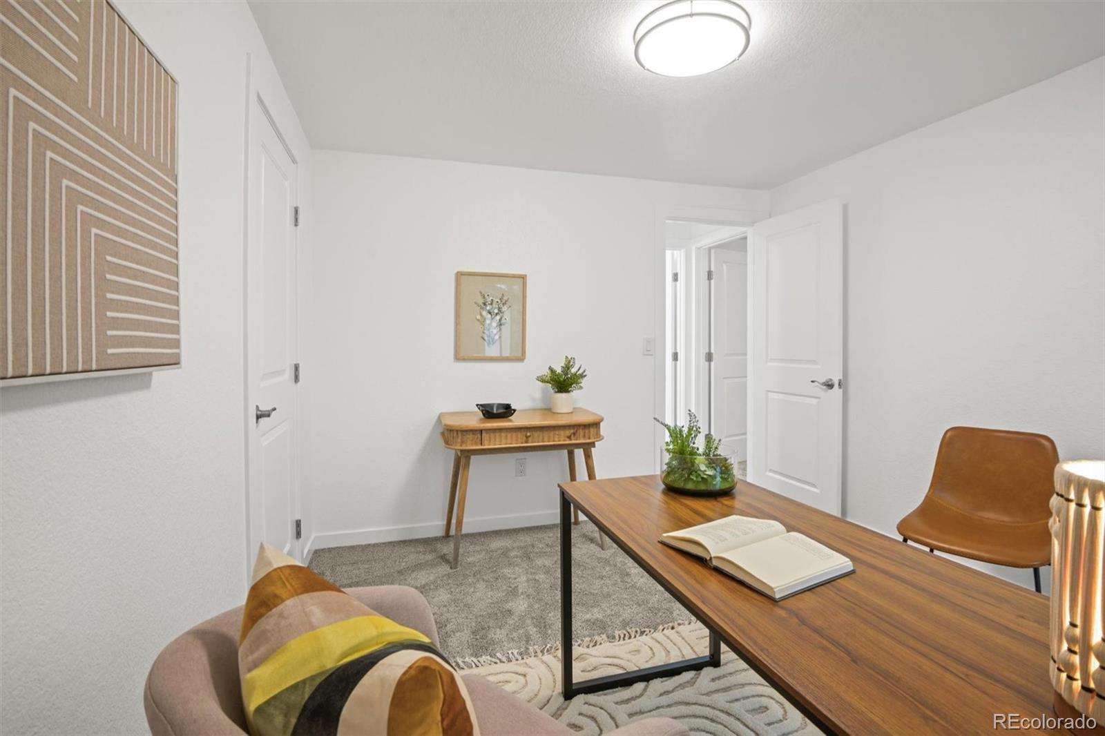 9340 Pierce Street Westminster, CO 80021 - Photo 16 of 29 a living room with furniture
