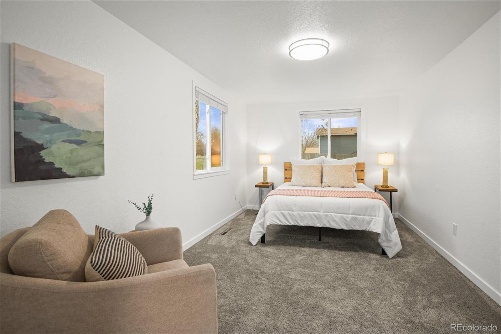 9340 Pierce Street Westminster, CO 80021 - Photo 19 of 29 a living room with furniture and a window