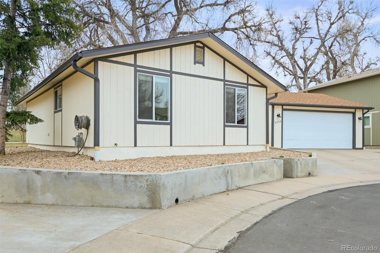 9340 Pierce Street Westminster, CO 80021 - Photo 26 of 29 a bathroom with a granite countertop sink and bathtub