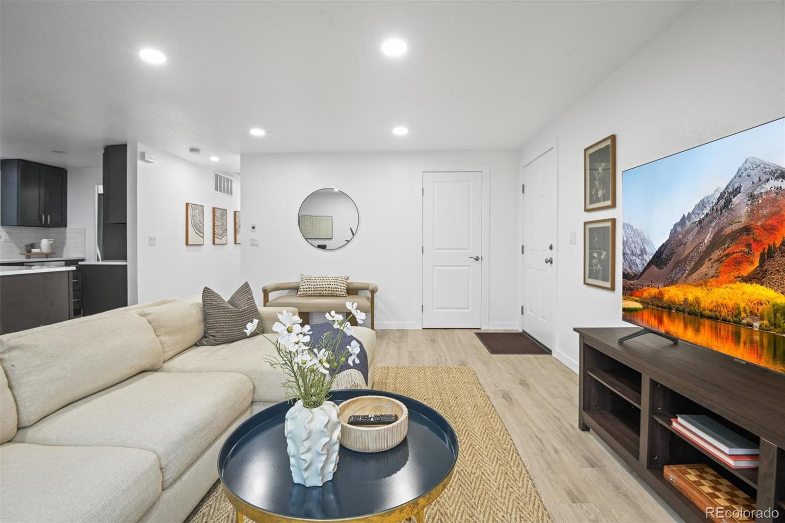 9340 Pierce Street Westminster, CO 80021 - Photo 3 of 29 a living room with furniture and a wooden floor