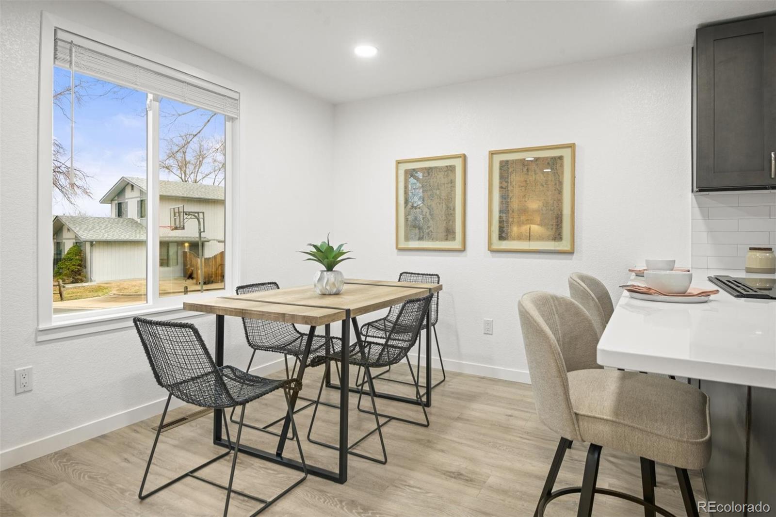 9340 Pierce Street Westminster, CO 80021 - Photo 7 of 29 a dining room with furniture and window