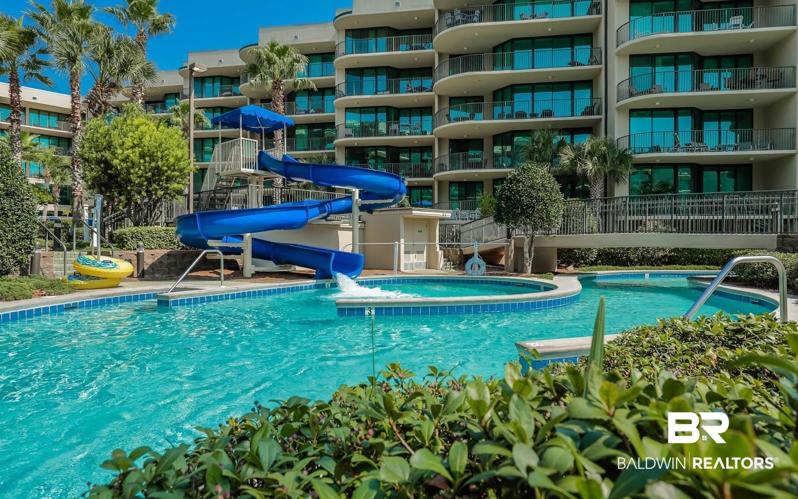27580 Canal Road, Unit 1429 Orange Beach, AL 36561 - Photo 22 of 45 Community pool with a water slide
