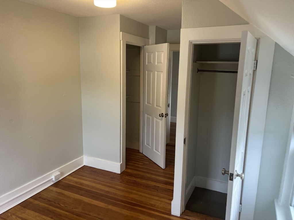 11 2nd Street, Unit 1 North Andover, MA 01845 - Photo 15 of 24 a view of a hallway with wooden floor