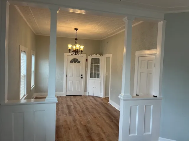 view of hall way with mirror