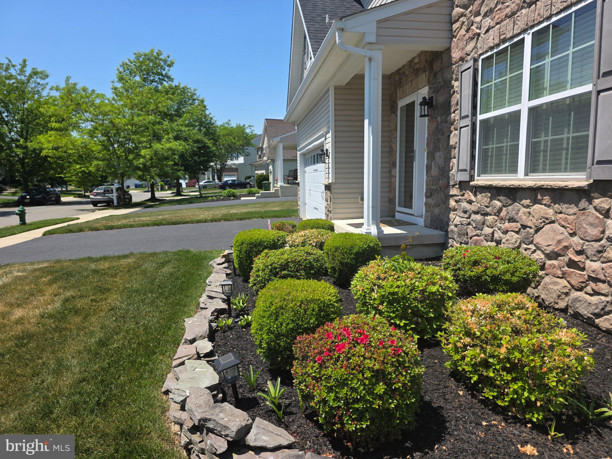 53 Buckeye Road Swedesboro, NJ 08085 - Photo 2 of 47 Lush greenery frames a charming entrance.