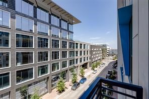 a view of balcony with wooden floor