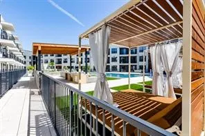 a view of balcony with wooden floor
