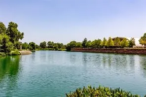 a view of a green field with clear sky