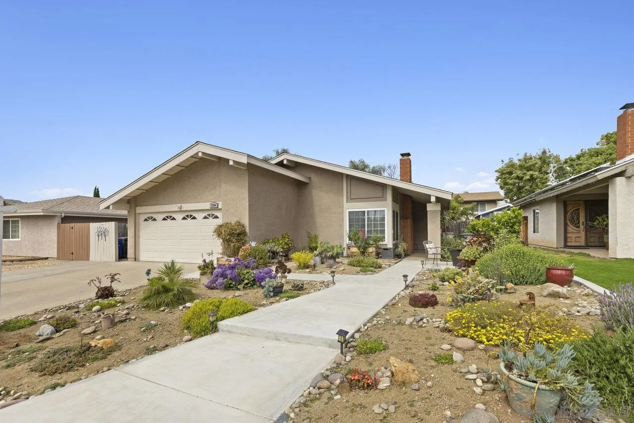 13344 Racquet Court Poway, CA 92064 - Photo 1 of 29 a front view of a house with a yard