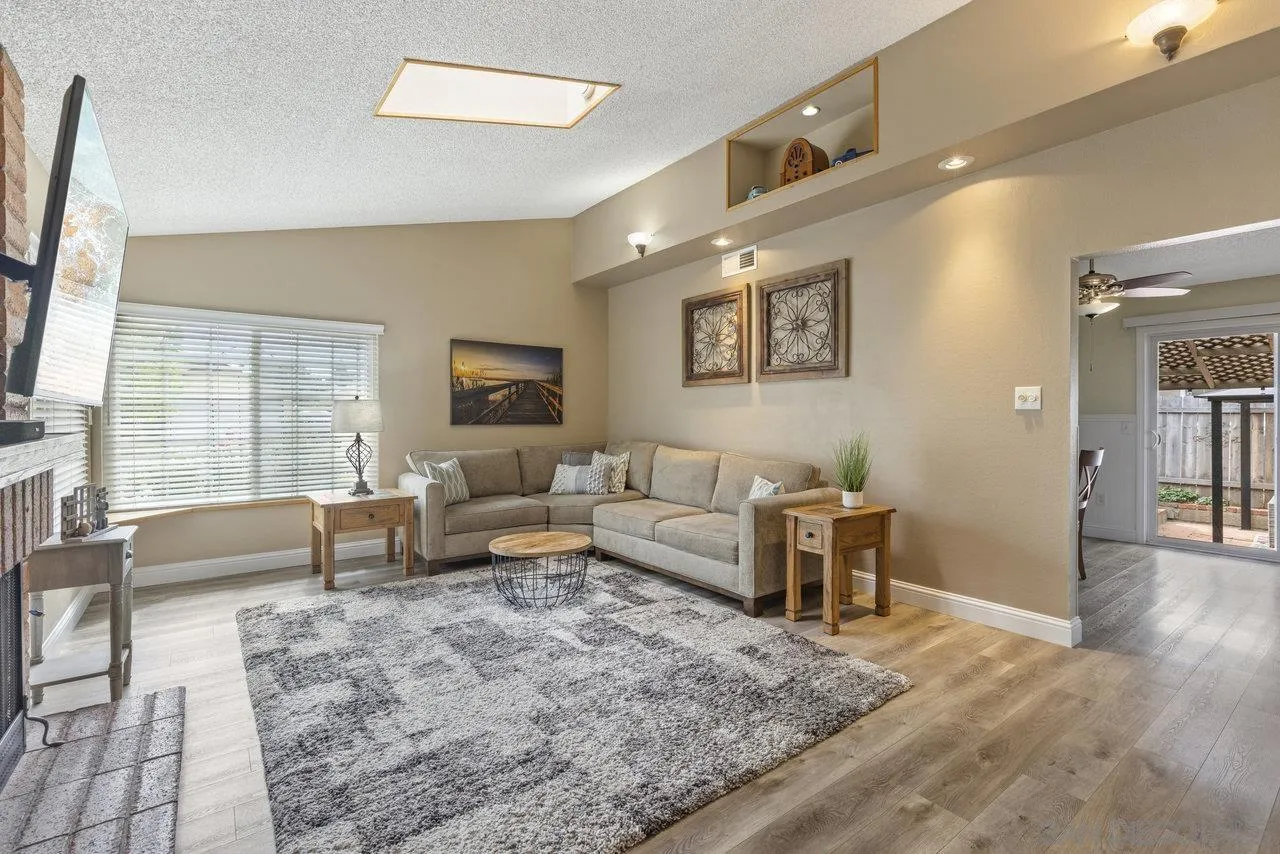 13344 Racquet Court Poway, CA 92064 - Photo 2 of 29 a living room with furniture and a couch