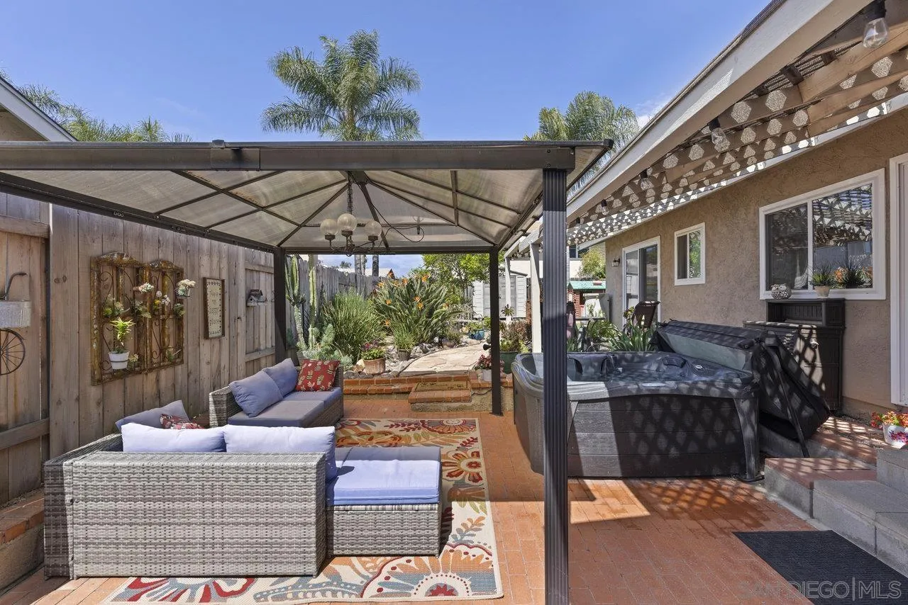 13344 Racquet Court Poway, CA 92064 - Photo 22 of 29 a outdoor living space with patio furniture and potted plants