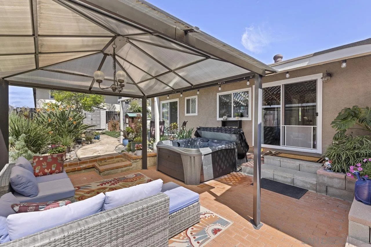 13344 Racquet Court Poway, CA 92064 - Photo 23 of 29 a view of a patio with couches and potted plants