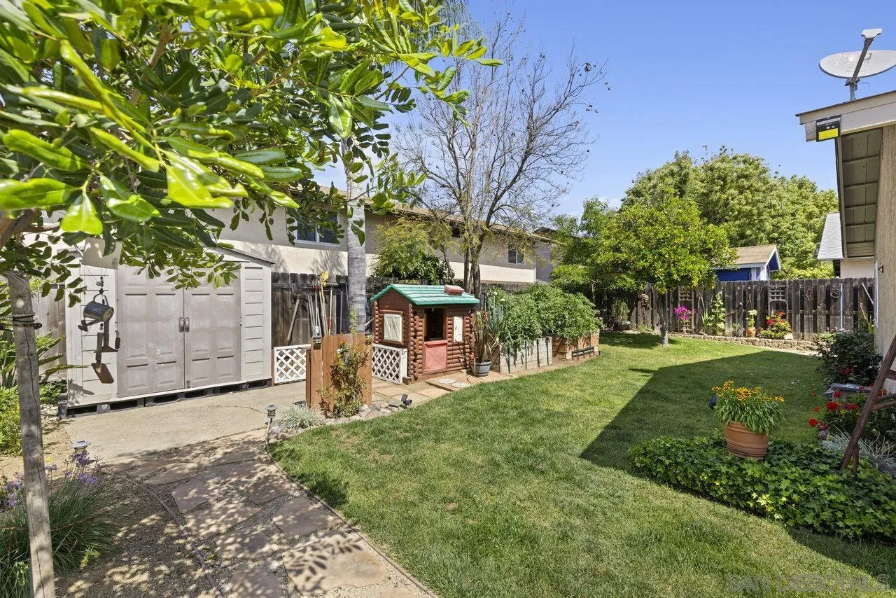 13344 Racquet Court Poway, CA 92064 - Photo 26 of 29 a front view of a house with garden