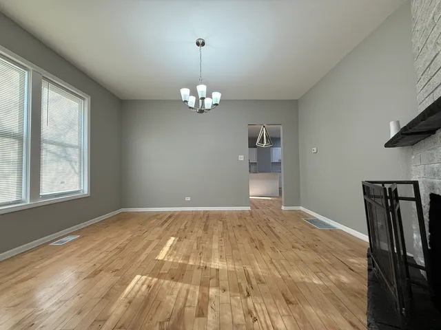 a view of livingroom with hardwood floor and window