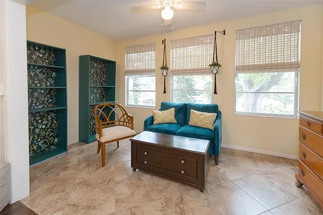 a living room with furniture and a window