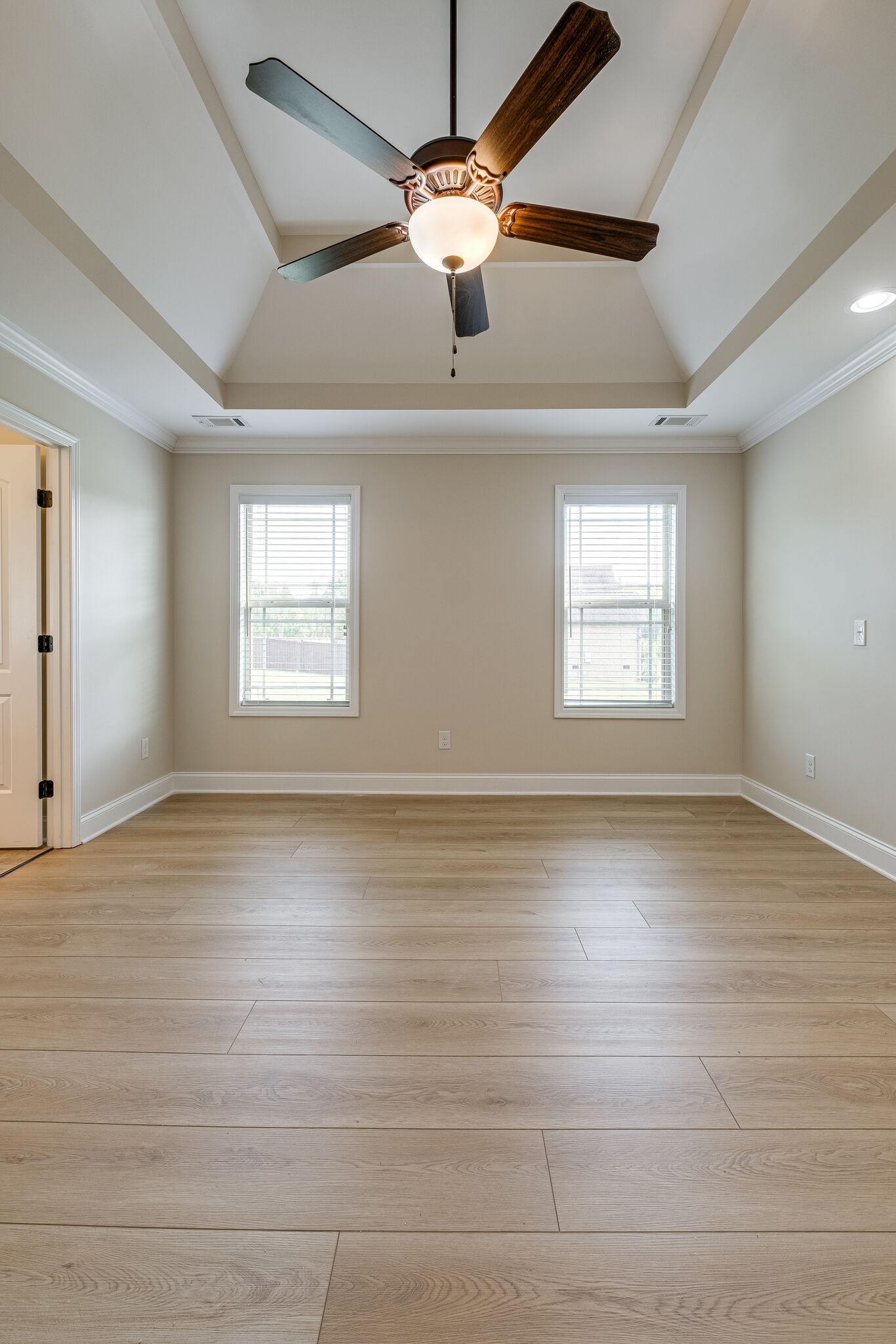 315 Abbey Road Lebanon, TN 37090 - Photo 15 of 35 a view of a livingroom with a ceiling fan window and wooden floor