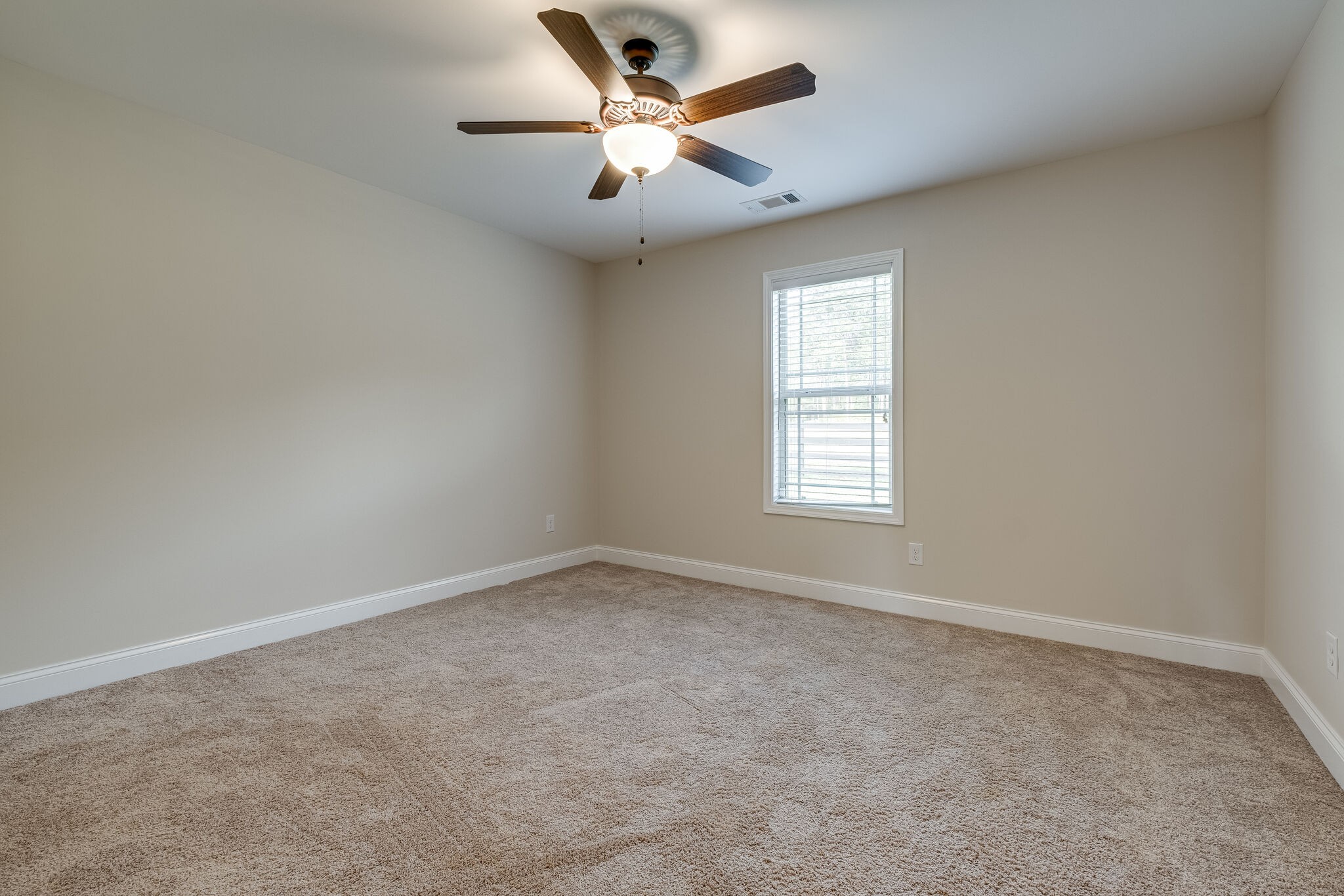 315 Abbey Road Lebanon, TN 37090 - Photo 25 of 35 an empty room with a window and a fan
