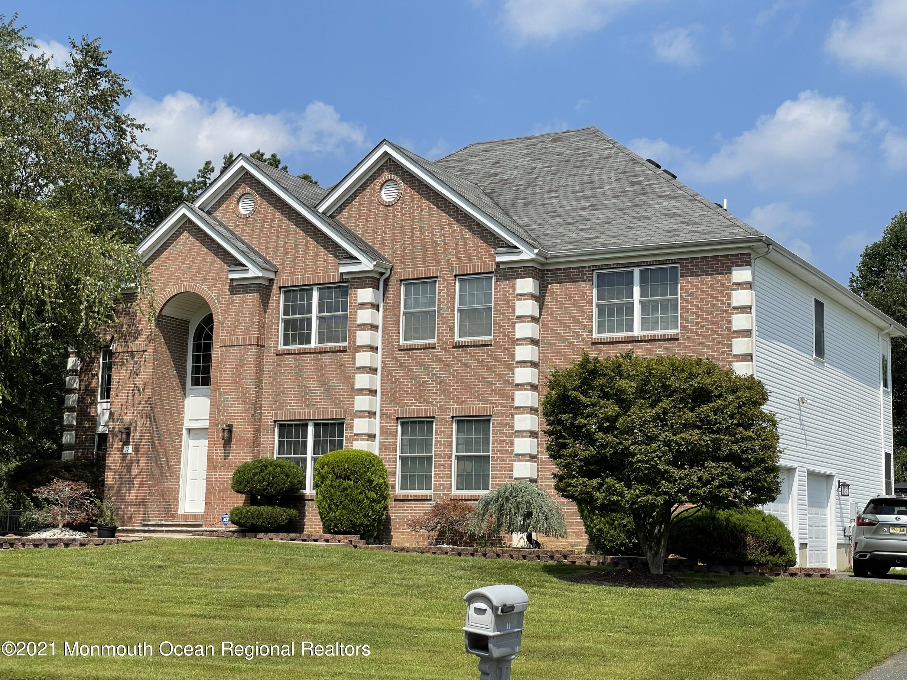 12 Cedar Knoll Road Jackson, NJ 08527 - Photo 1 of 1 front view of a house with a yard