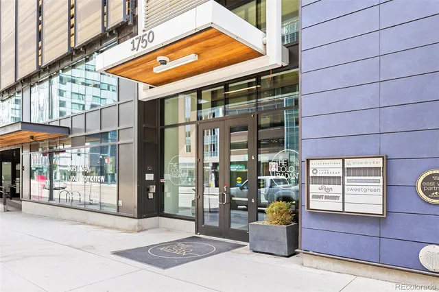 a view of a bathroom from a hallway