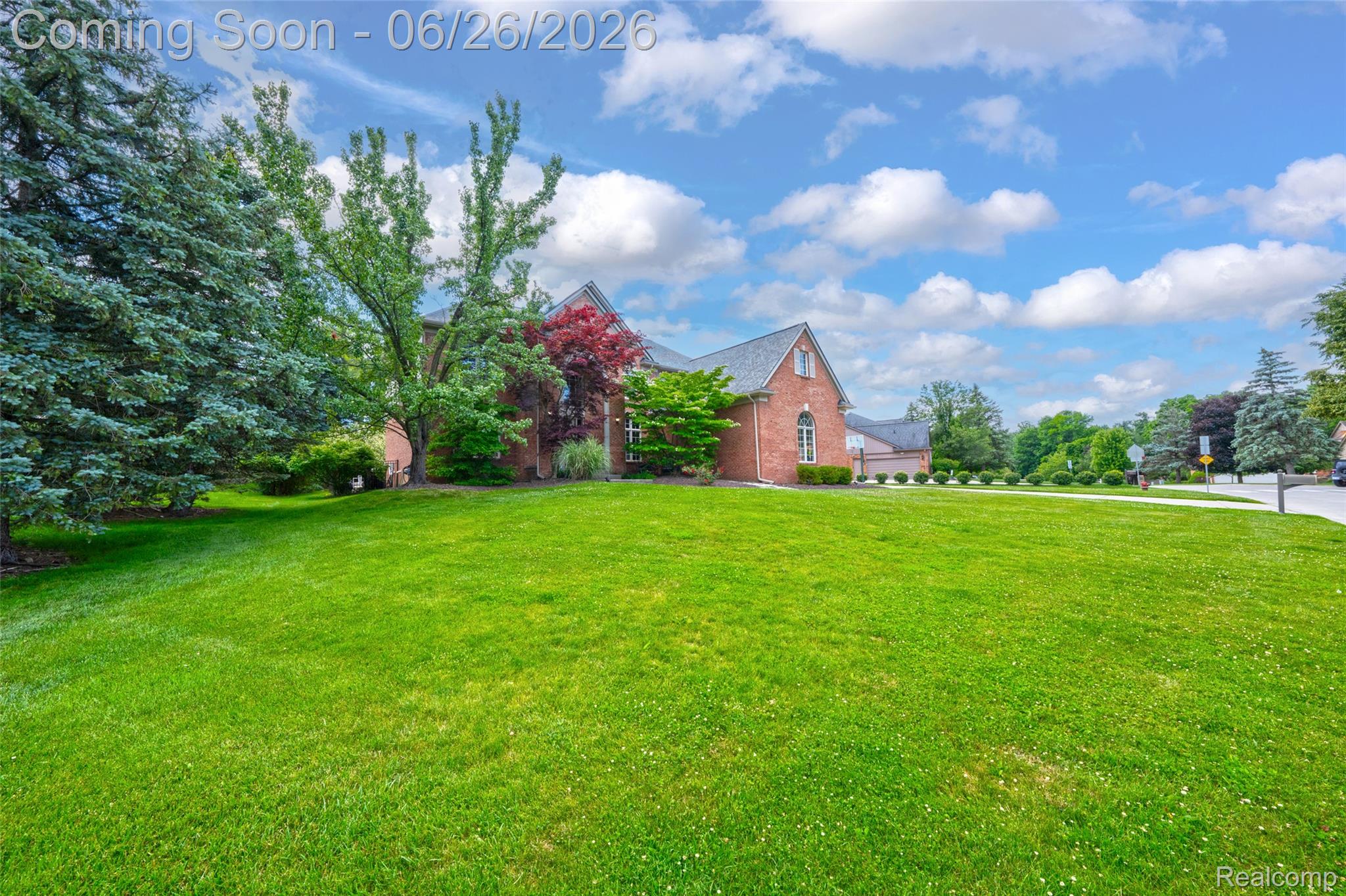 2619 Lambeth Park Rochester, MI 48306 - Photo 67 of 71 Expansive front lawn with mature evergreen and deciduous trees