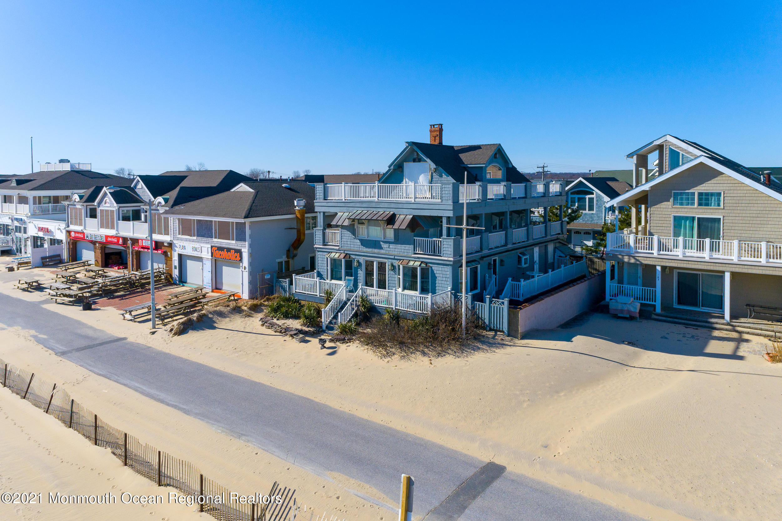 a view of a house with roof deck