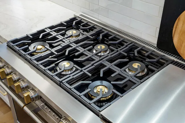 a view of a hallway with wooden floor and entryway