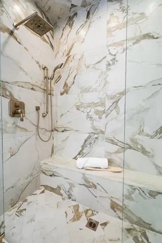 a view of a swimming pool with chairs