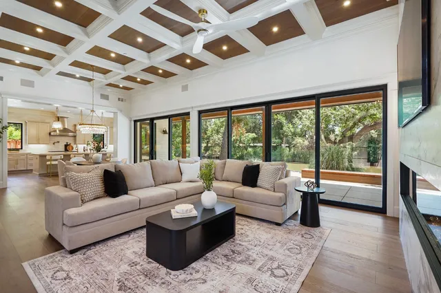 a kitchen with center island table and chairs in it
