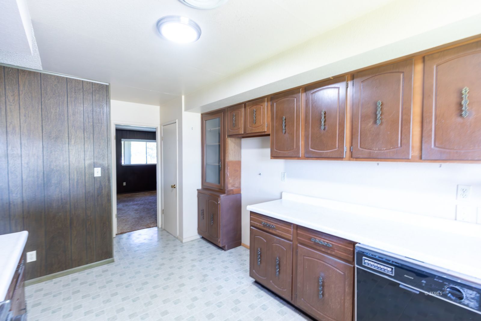 1125 South Norma Street Ridgecrest, CA 93555 - Photo 16 of 34 a kitchen with stainless steel appliances granite countertop a refrigerator and a sink