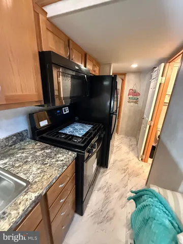 a bedroom with a bed and a mirror