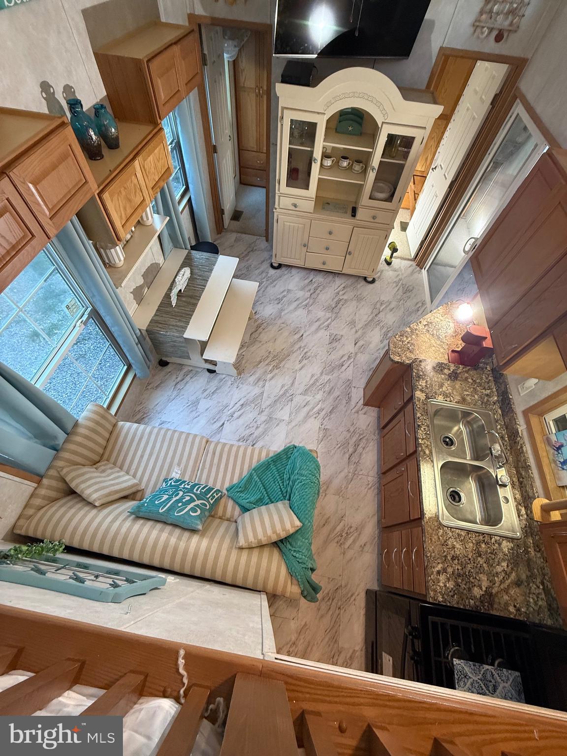 515 Corsons Tavern Road, Unit H61 Ocean View, NJ 08230 - Photo 3 of 19 a view of a couches with wooden floor