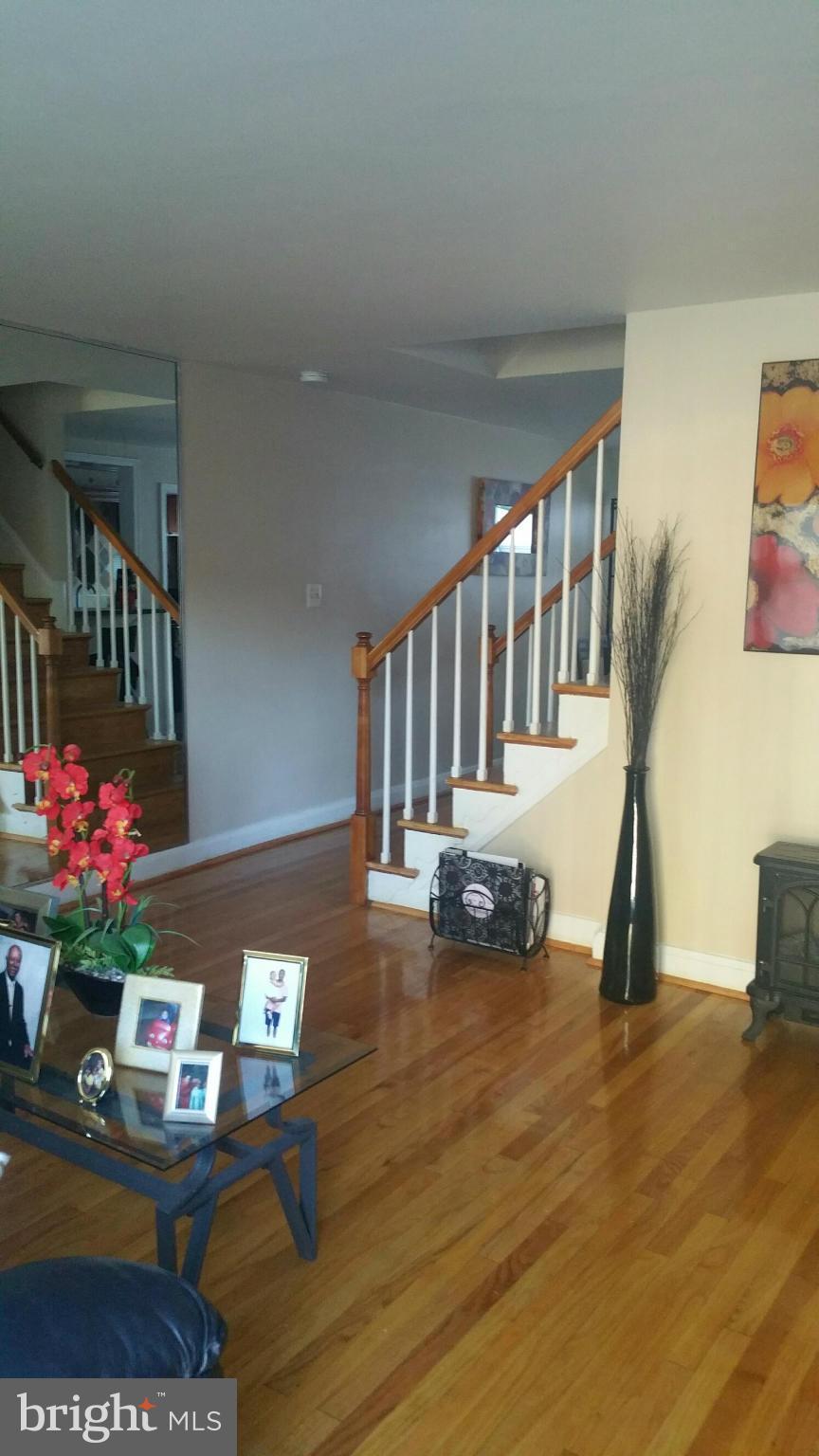 1528 Clairidge Road Baltimore, MD 21207 - Photo 3 of 14 a view of a living room and dining room