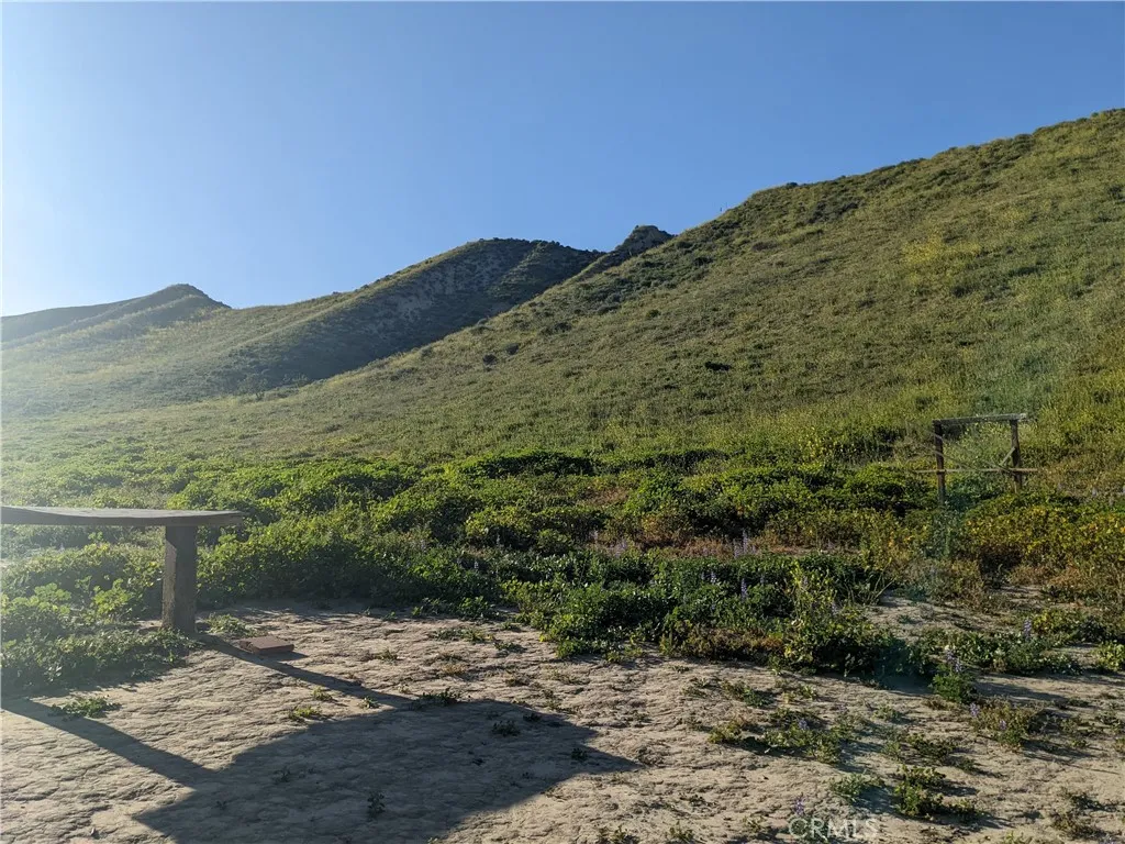462 Waters Road Moorpark, CA 93021 - Photo 10 of 12 a view of a large mountain with mountains in the background
