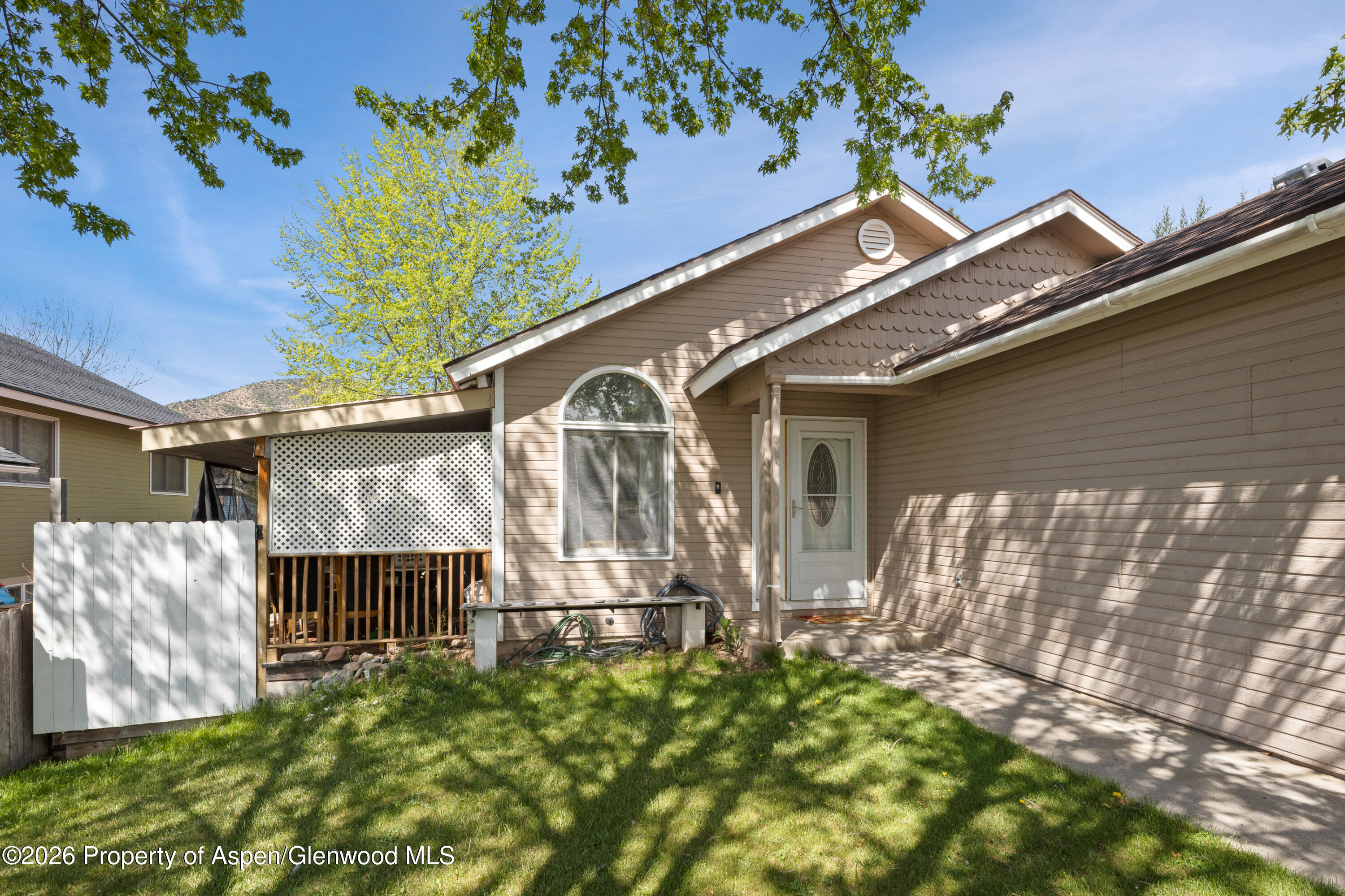 164 Current Drive New Castle, CO 81647 - Photo 5 of 34 a front view of a house with garden