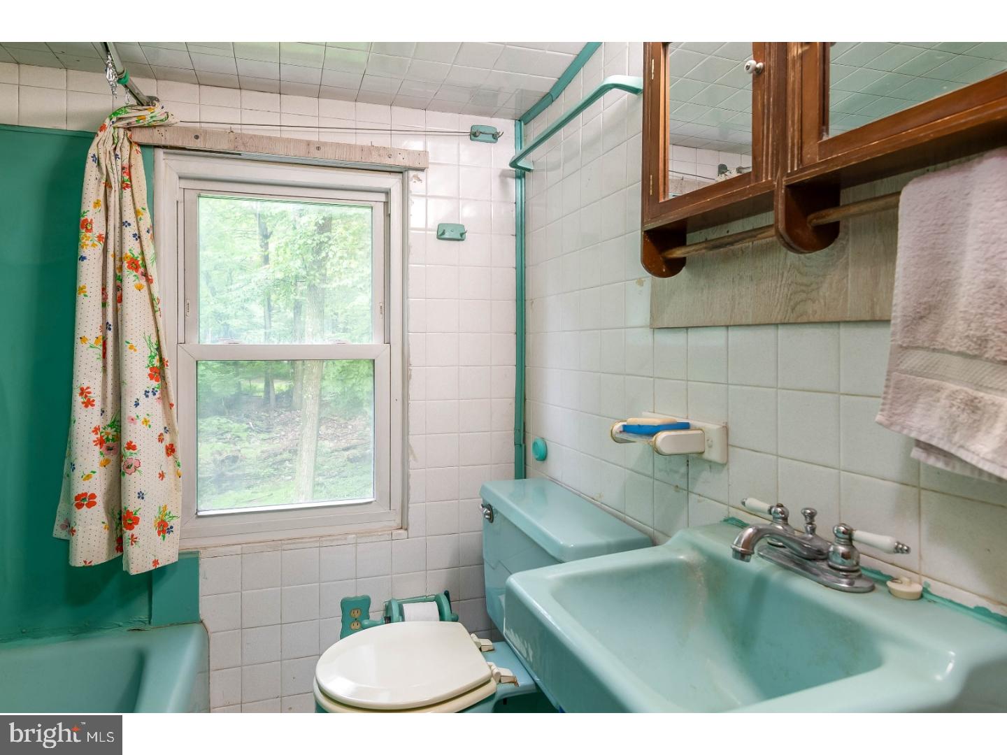 19 Petsch Road Reading, PA 19606 - Photo 7 of 19 a bathroom with a sink toilet and tub