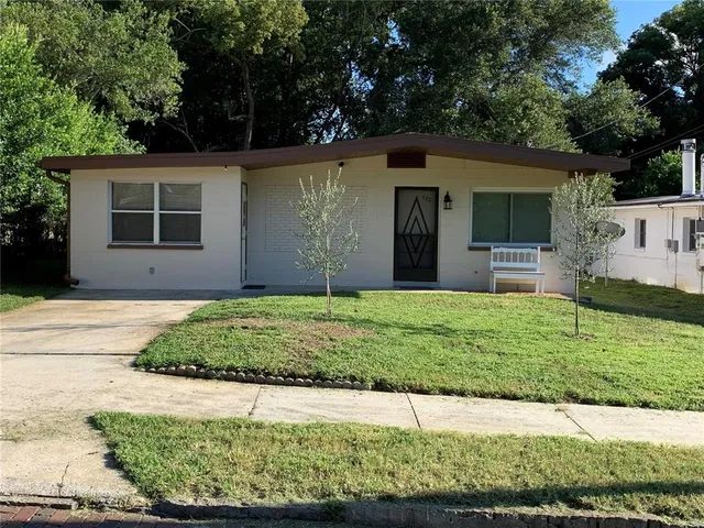 a front view of house with yard