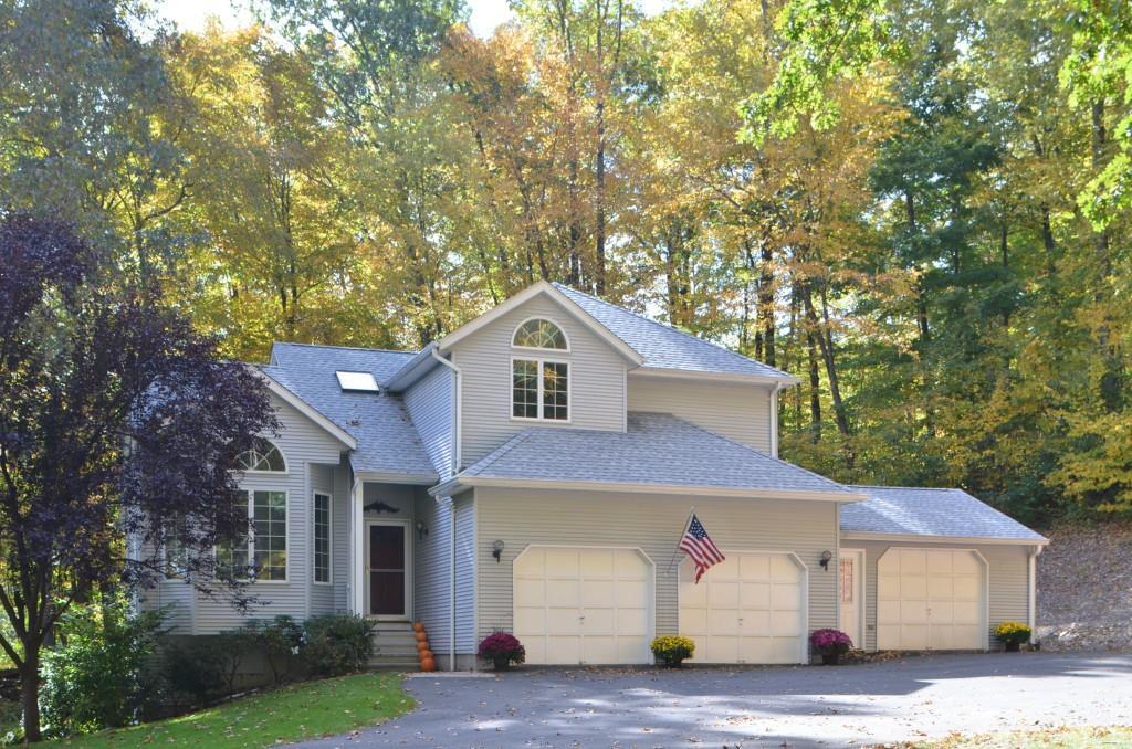 821 Marion Road Cheshire, CT 06410 - Photo 1 of 1 a front view of a house with a yard