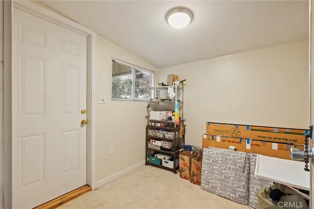 a view of a room with racks on the wall