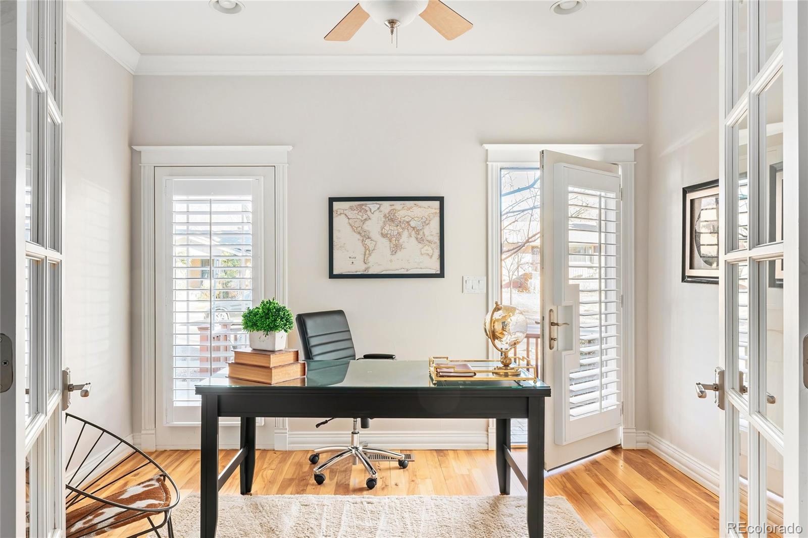 747 South Emerson Street Denver, CO 80209 - Photo 12 of 48 a living room with furniture and a window