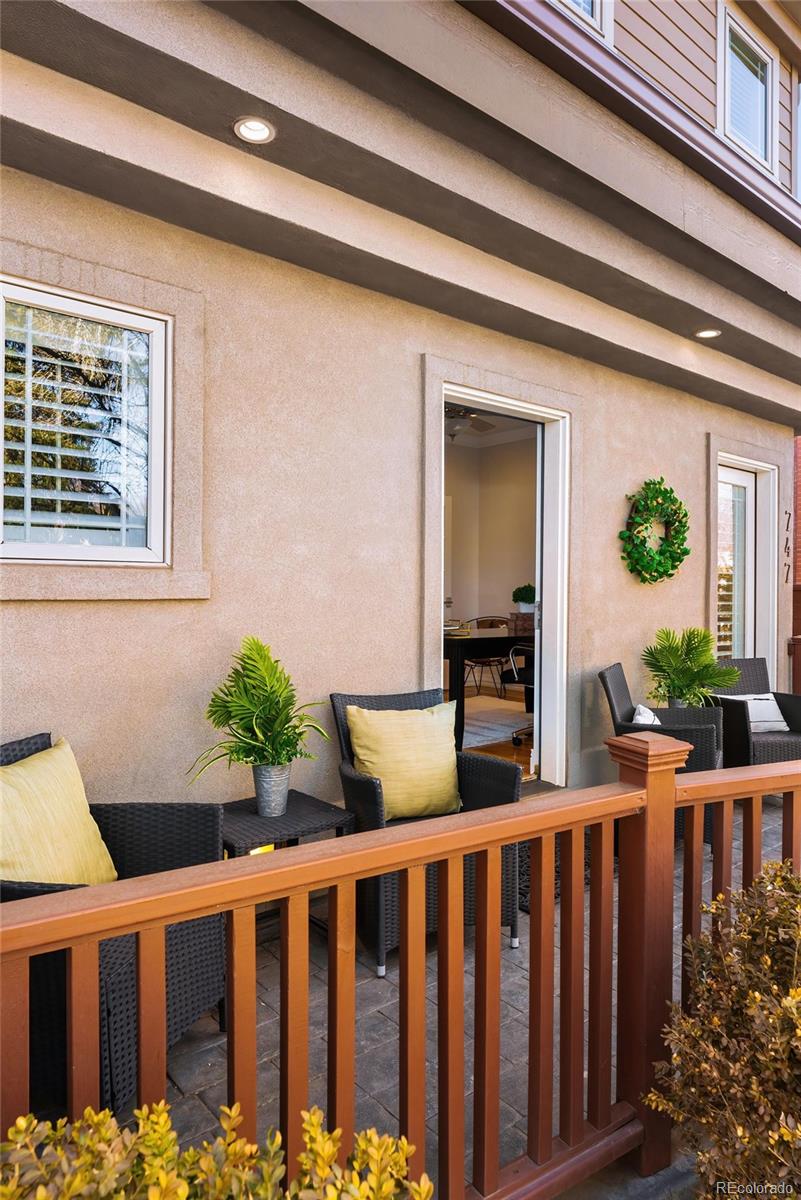 747 South Emerson Street Denver, CO 80209 - Photo 13 of 48 a front view of a house with a garden