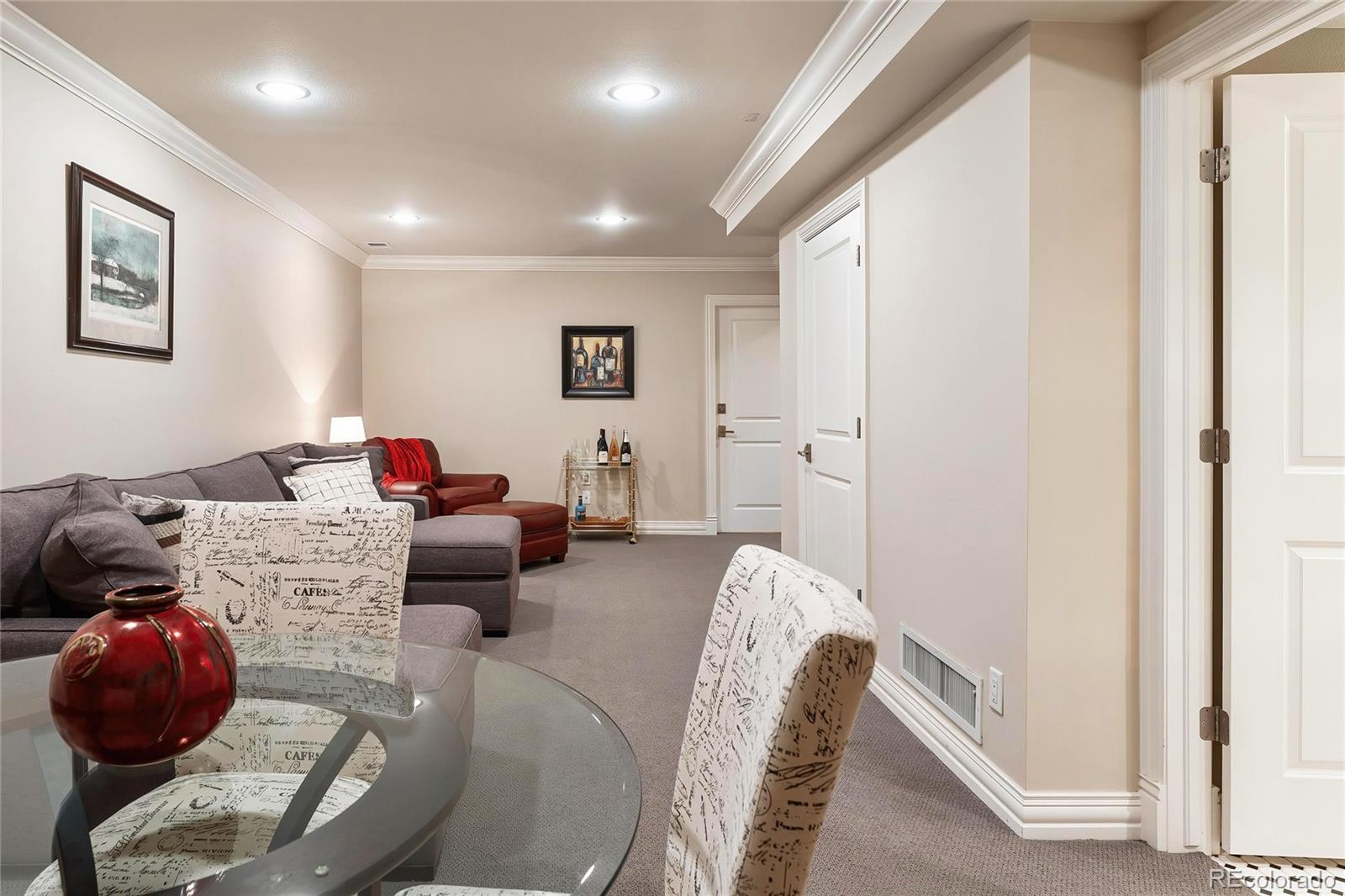 747 South Emerson Street Denver, CO 80209 - Photo 29 of 48 a bedroom with furniture and a couch