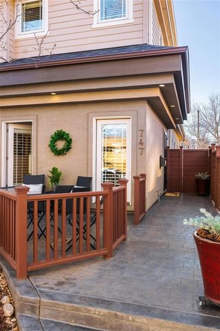 a view of front door of house with stairs