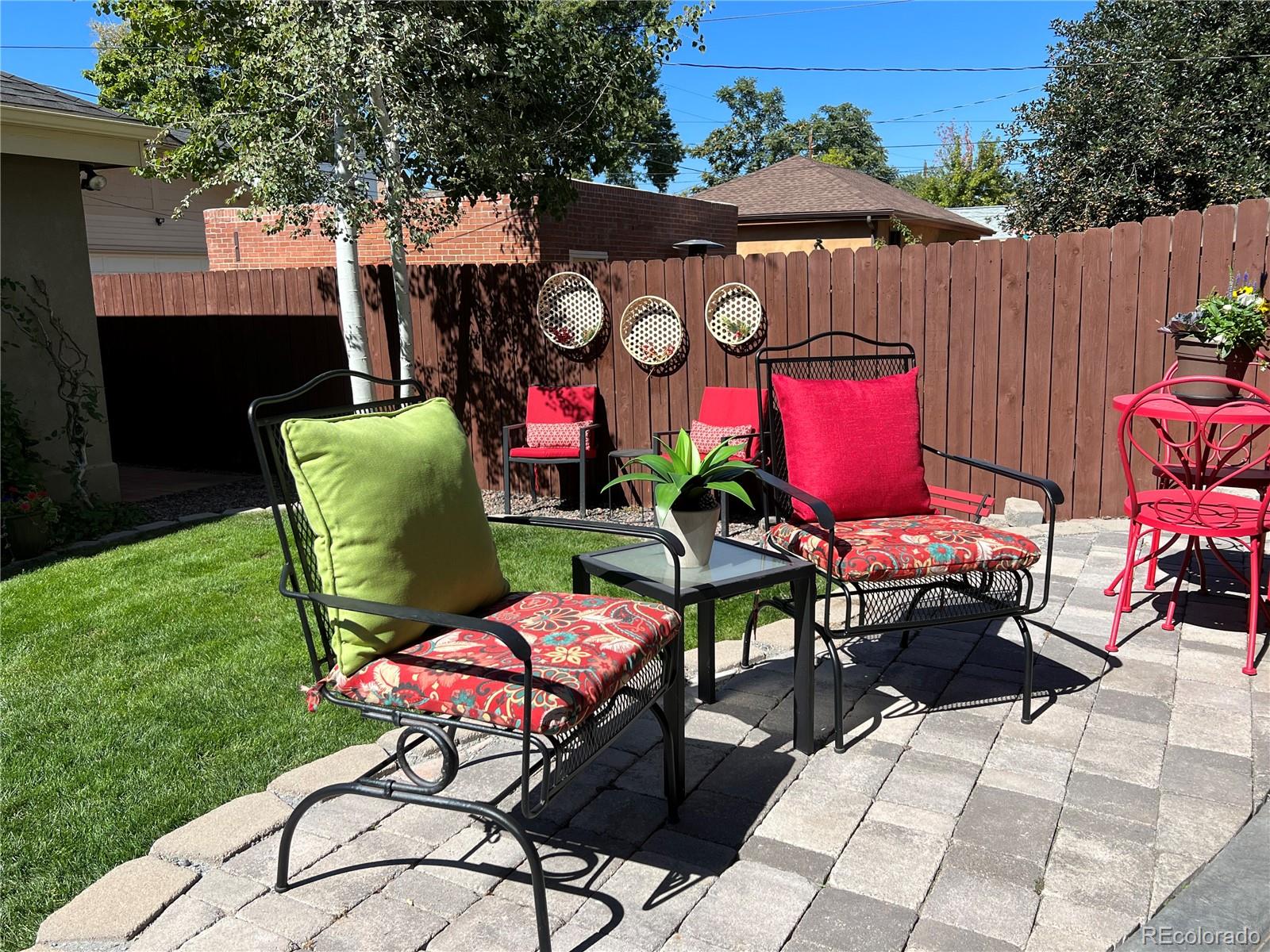 747 South Emerson Street Denver, CO 80209 - Photo 46 of 48 a view of a chairs and table in backyard