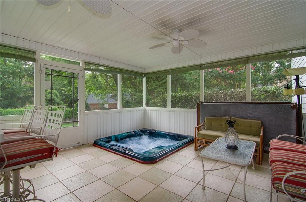 1507 Heathcliff Road High Point, NC 27262 - Photo 2 of 30 The Weather is Now PERFECT for PRIVATE SUNKEN 6+ PERSON HOT TUB! Enjoy your Morning Coffee or Dine with your Favorite Friends/Family on this Enormous Screened Porch. The Porch was Designed for Privacy with a Sunken Jacuzzi and Tall Shrubbery on Both Sides of the Porch.